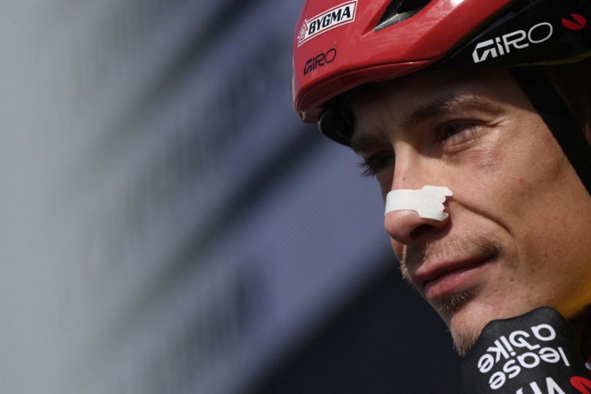 Team Visma - Lease a Bike's Danish rider Jonas Vingegaard looks on as he waits for the start of the 5th stage of the Paris-Nice cycling race, 206.3 km between Cormoranche-sur-Saône and Colombier-le-Vieux, on March 12, 2026.  Anne-Christine POUJOULAT / AFP