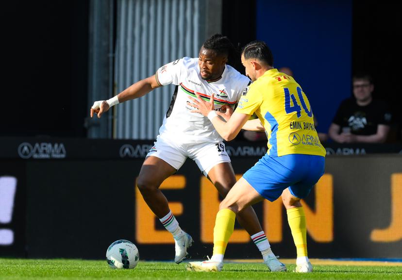 OHL's Chukwubuikem Ikwuemesi and Westerlo's Emin Bayram pictured during a soccer match between KVC Westerlo and Oud-Heverlee Leuven, Saturday 05 April 2025 in Westerlo, on day 2 (out of 10) of the Europe Play-offs of the 2024-2025 'Jupiler Pro League' first division of the Belgian championship. BELGA PHOTO JOHN THYS