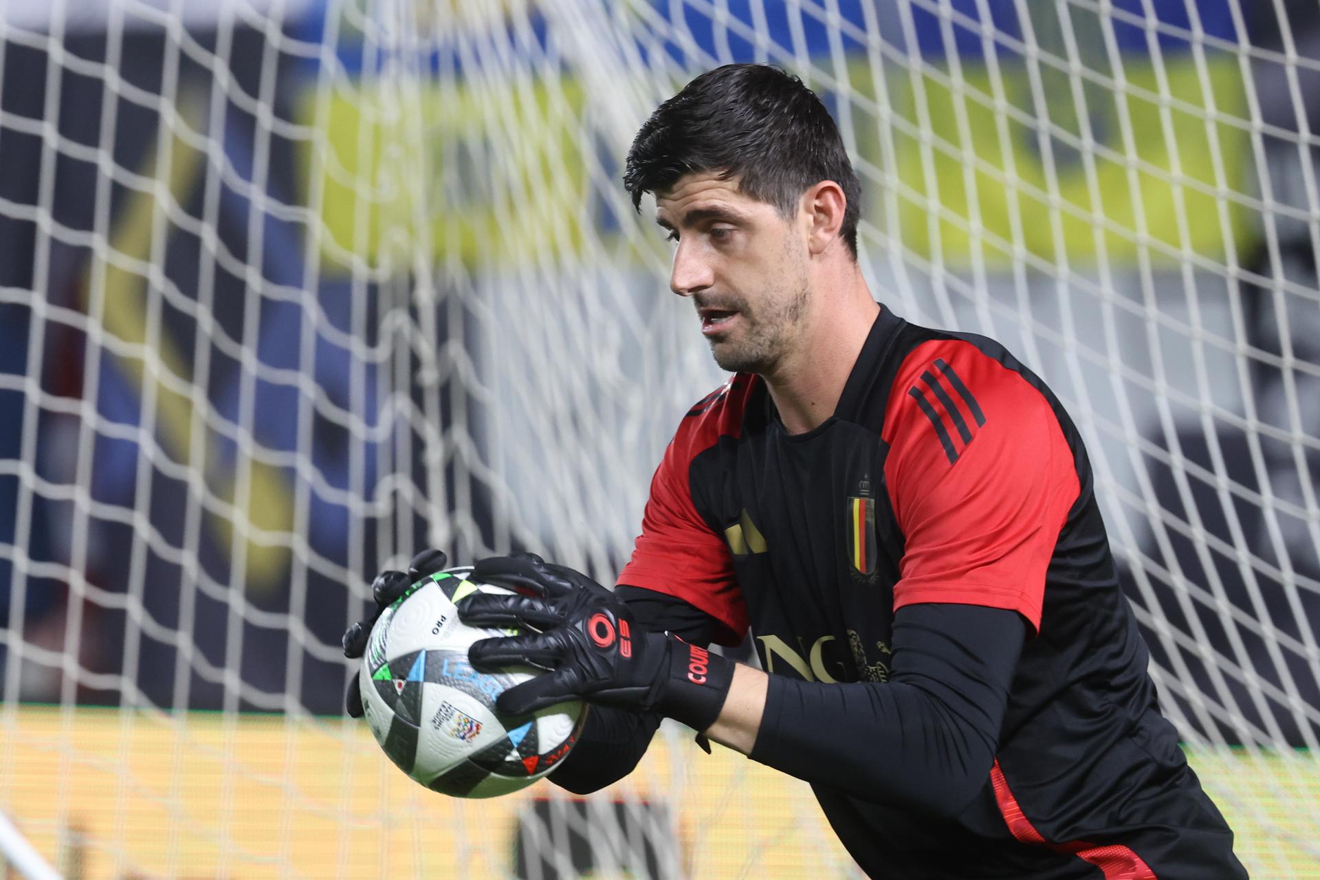 Belgium's goalkeeper Thibaut Courtois pictured in action during the warming-up for a soccer game between Belgian national team the Red Devils and Ukraine, Thursday 20 March 2025 in Murcia, Spain, the first leg of the play-offs in the Nations League. BELGA PHOTO VIRGINIE LEFOUR