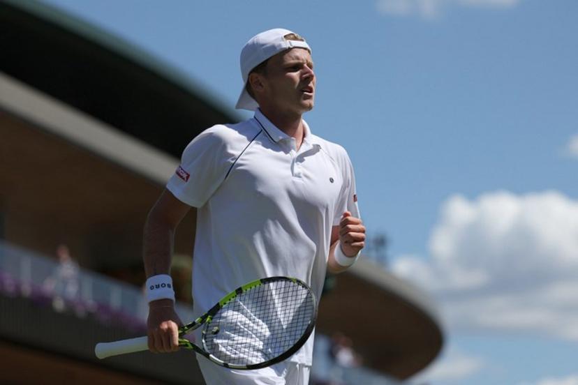 Netherlands' Jesper de Jong reacts as he plays against Serbia's Miomir Kecmanovic during their men's singles second round tennis match on the fourth day of the 2025 Wimbledon Championships at The All England Lawn Tennis and Croquet Club in Wimbledon, southwest London, on July 3, 2025.  Adrian Dennis / AFP