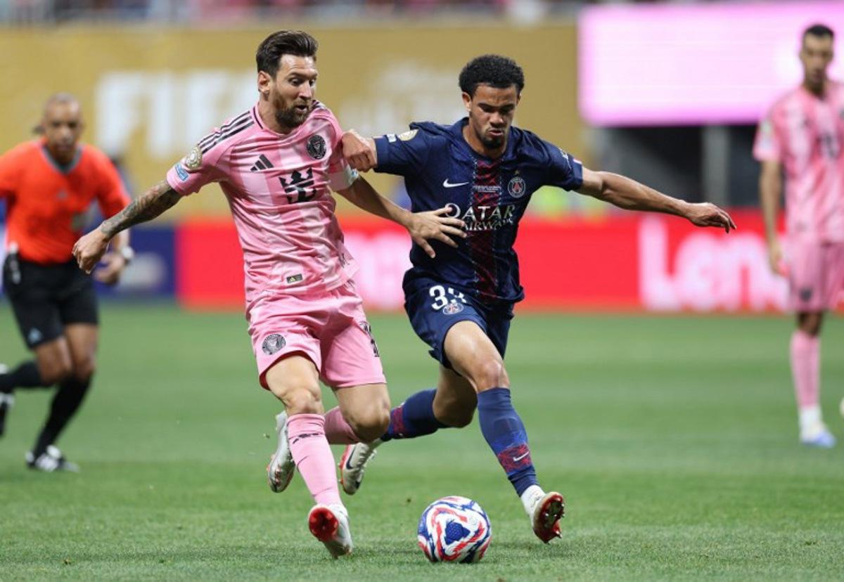 Inter Miami's Argentine forward #10 Lionel Messi and Paris Saint-Germain's French midfielder #33 Warren Zaire-Emery fight for the ball during the FIFA Club World Cup 2025 round of 16 football match between France's Paris Saint-Germain and US Inter Miami at the Mercedes-Benz Stadium in Atlanta on June 29, 2025.  CHARLY TRIBALLEAU / AFP