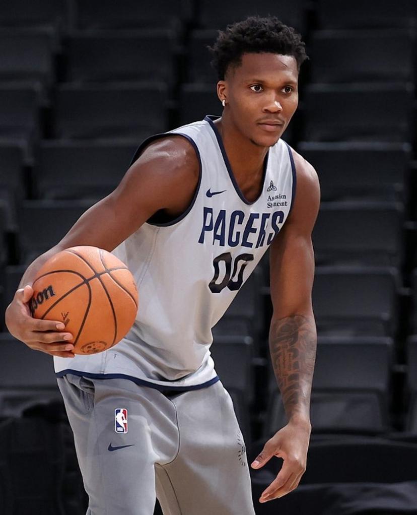 Indiana Pacers' Canadian guard #00 Bennedict Mathurin holds the ball as he attends a training session at the Accor Arena - Palais Omnisports de Paris-Bercy - in Paris on January 22, 2025.  San Antonio Spurs will face the Indiana Pacers on January 23 and 25 at Bercy, two NBA games relocated to Paris.  FRANCK FIFE / AFP