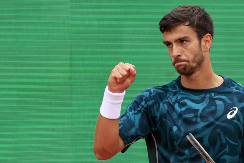 Italy's Lorenzo Musetti reacts after a point as he plays against Australia's Alex De Minaur during the Monte Carlo ATP Masters Series Tournament semi-final tennis match at the Monte Carlo Country Club in Roquebrune-Cap-Martin on April 12, 2025.  Valery HACHE / AFP