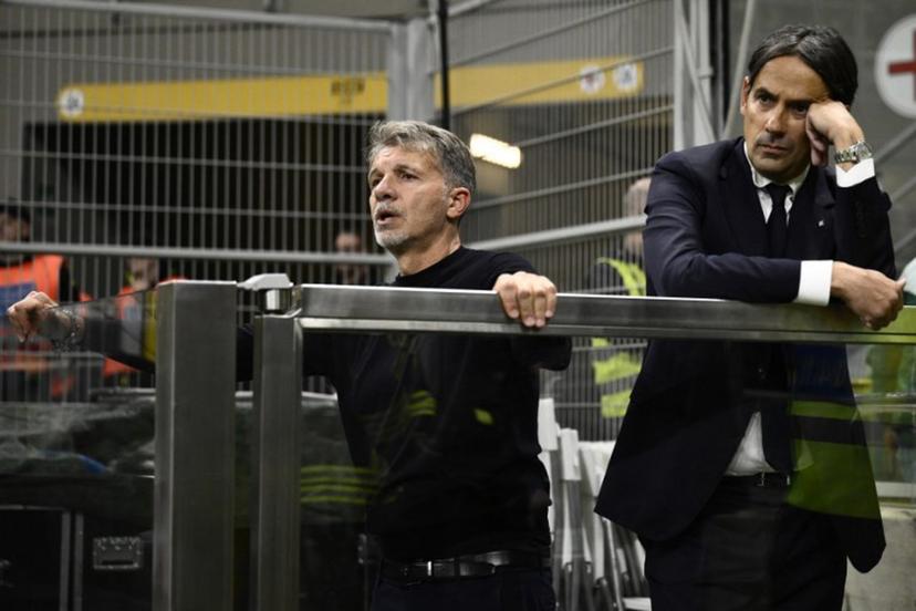 Lazio's Italian head coach Marco Baroni and Inter Milan's Italian coach Simone Inzaghi react during the Italian Serie A football match between Inter Milan and Lazio at San Siro stadium in Milan, on May 18, 2025.  Nicolo Campo / AFP