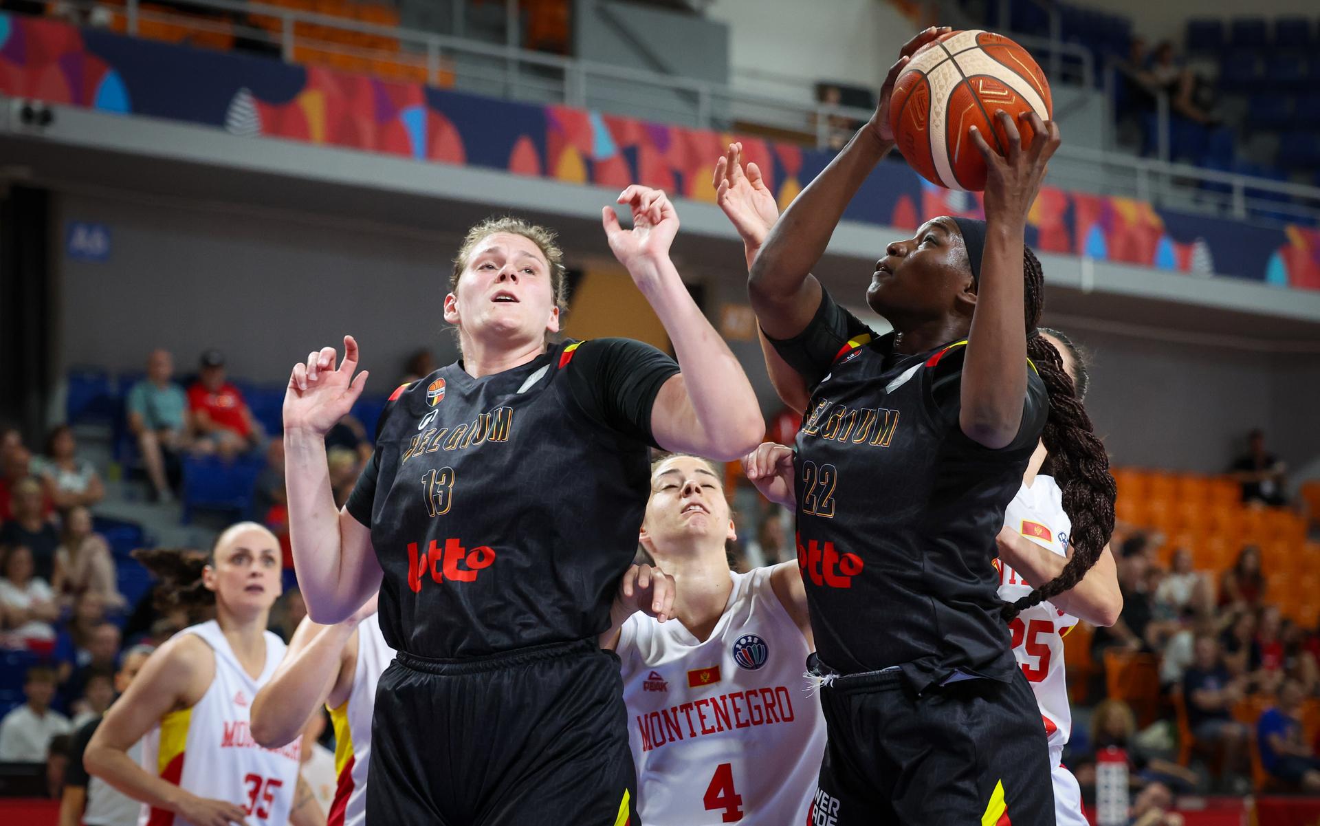 Belgium's Kyara Linskens and Belgium's Bethy Mununga fight for the ball during the second game in the group stage (group C) between Montenegro and Belgian national women team 'the Belgian Cats', in Brno, Czech Republlic, on Friday 20 June 2025, at the FIBA Women's EuroBasket 2025. BELGA PHOTO VIRGINIE LEFOUR
