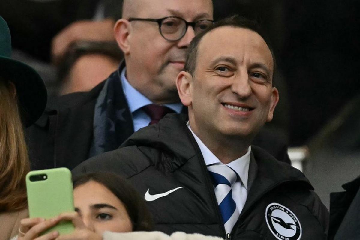 Brighton's chairman Tony Bloom takes his seat for the English Premier League football match between Brighton and Hove Albion and Tottenham Hotspur at the American Express Community Stadium in Brighton, southern England on October 6, 2024.  Glyn KIRK / AFP