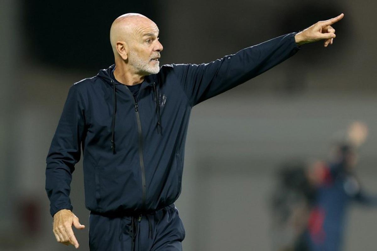 Nassr's Italian coach Stefano Pioli instructs his players during the Saudi Pro League football match between Damac and Al-Nassr at Prince Sultan bin Abdulaziz Sports City in Abha on April 22, 2025.  AFP