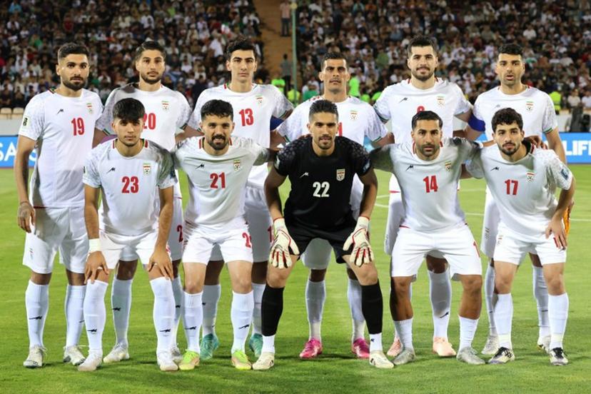 Iran's players pose for a team picture ahead of the FIFA World Cup 2026 Asia zone qualifiers group A football match between Iran and the North Korea at the Azadi Sports Complex in Tehran on June 10, 2025.  ATTA KENARE / AFP