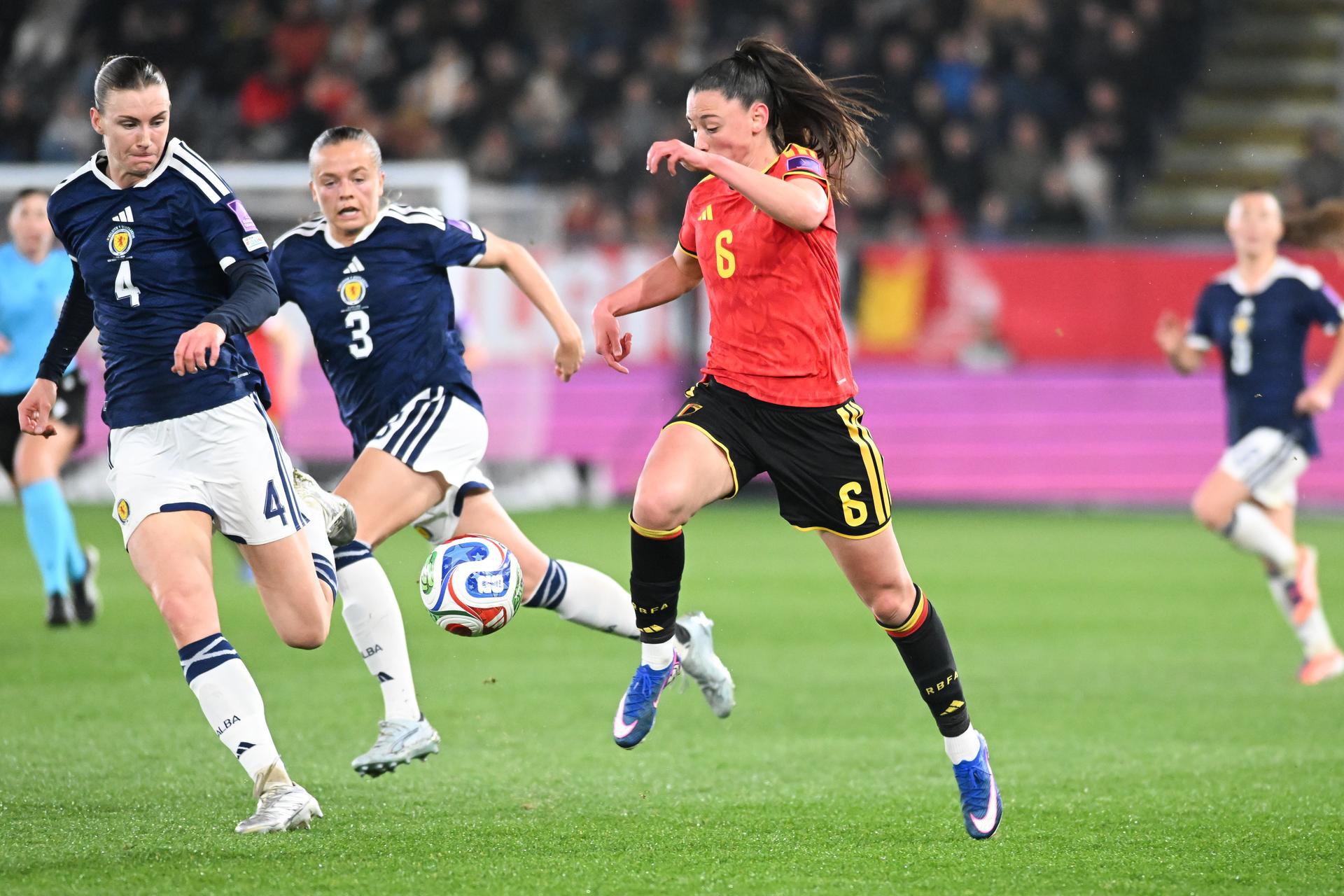 Scotland's Jenna Clark and Belgium's Aurelie Reynders pictured during a soccer game between Belgium's national women's team the Red Flames and Scotland, on Saturday 18 April 2026 in Leuven, in the fourth of six games of the qualifiers for the 2027 FIFA Women's World Cup. BELGA PHOTO JILL DELSAUX