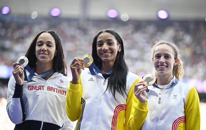 Great Britain's Katarina Johnson-Thompson , winner of the silver medal, Belgian Nafissatou Nafi Thiam , winner of the gold medal and Belgian athlete Noor Vidts , winner of the bronze medal pictured on the podium during the medal ceremony of the women's heptathlon at the athletics competition at the Paris 2024 Olympic Games, on Saturday 10 August 2024 in Paris, France. The Games of the XXXIII Olympiad are taking place in Paris from 26 July to 11 August. The Belgian delegation counts 165 athletes competing in 21 sports. BELGA PHOTO JASPER JACOBS