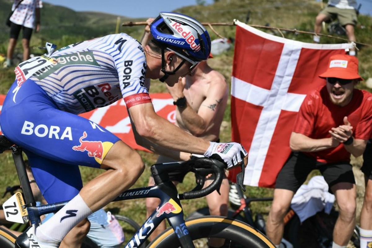Red Bull - BORA - hansgrohe team's German rider Florian Lipowitz cycles in the ascent of Hautacam during the 12th stage of the 112th edition of the Tour de France cycling race, 180.6 km between Auch and Hautacam, in the Pyrenees mountains of southwestern France, on July 17, 2025.  Marco BERTORELLO / AFP