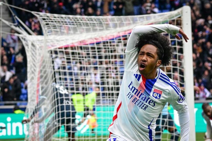Lyon's Belgium forward #11 Malick Fofana celebrates after scoring a goal during the French L1 football match between Olympique Lyonnais (OL) and Le Havre AC at the Groupama Stadium in Decines-Charpieu, central-eastern France, on March 16, 2025.  OLIVIER CHASSIGNOLE / AFP