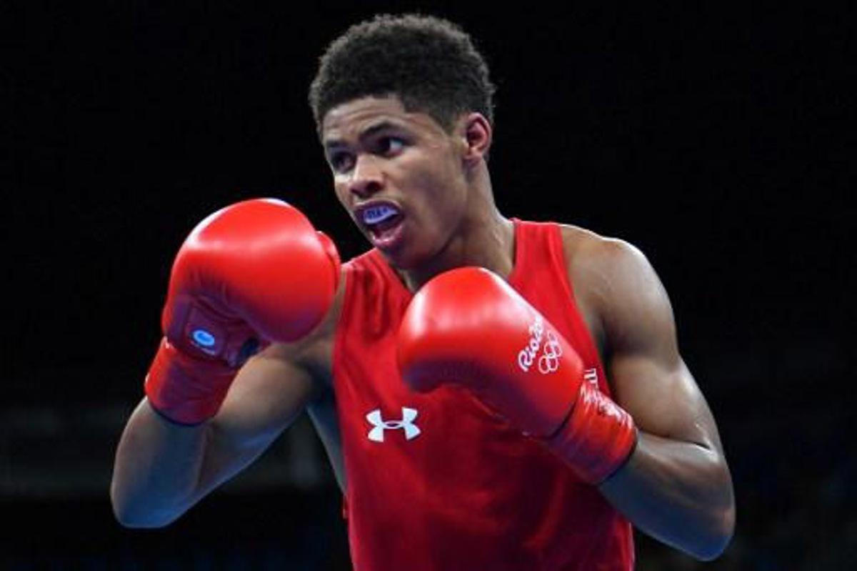USA's Shakur Stevenson (red) fights Cuba's Robeisy Ramirez (blue) during the Men's Bantam (56kg) Final Bout at the Rio 2016 Olympic Games at the Riocentro - Pavilion 6 in Rio de Janeiro on August 20, 2016.   
Yuri CORTEZ / AFP