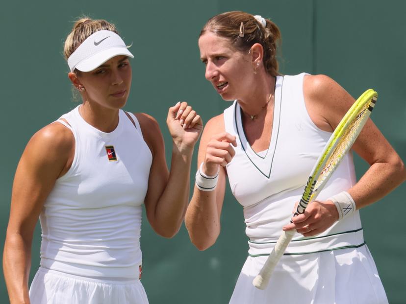 Romanian Jaqueline Cristian and Belgian Magali Kempen pictured during a doubles tennis match between Romanian-Belgian pair Cristian-Kempen and Hungarian-Brazilian pair Babos-Stefani, in the first round of the women's doubles at the 2025 Wimbledon grand slam tournament, Thursday 03 July 2025 at the All England Tennis Club, in South-West London, Britain. BELGA PHOTO BENOIT DOPPAGNE
