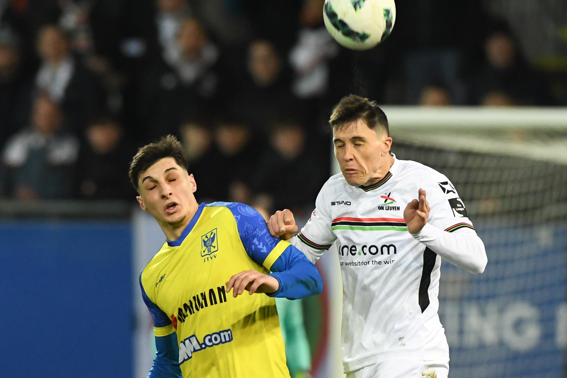 STVV's Andres Ferrari and OHL's Federico Fede Ricca pictured in action during a soccer match between Oud-Heverlee Leuven and Sint-Truiden VV, Sunday 16 March 2025 in Heverlee, on day 30 of the 2024-2025 season of the 'Jupiler Pro League' first division of the Belgian championship. BELGA PHOTO JILL DELSAUX