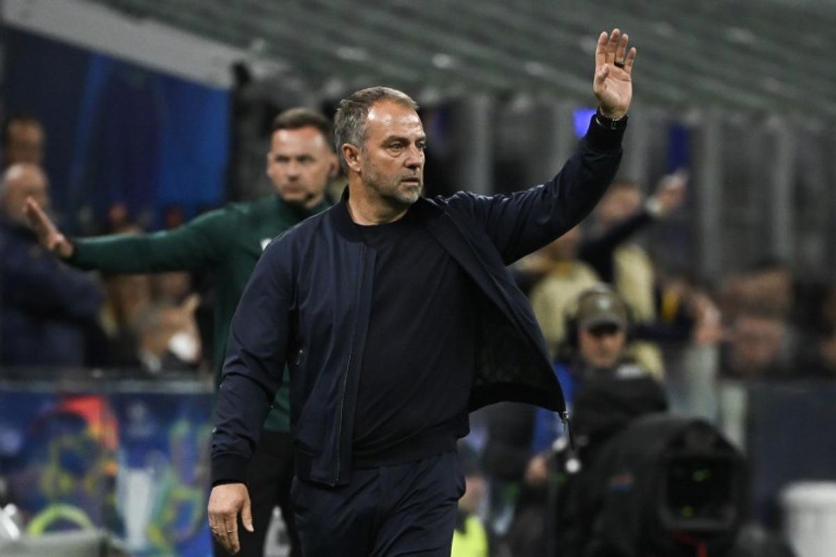 Barcelona's German coach Hans-Dieter Flick shouts instructions to his players from the touchline during the UEFA Champions League semi-final second leg football match between Inter Milan and FC Barcelona at the San Siro stadium in Milan on May 6, 2025.  PIERO CRUCIATTI / AFP