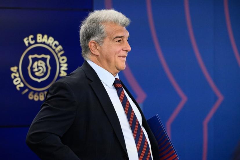 FC Barcelona's President Joan Laporta attends a press conference at the Ciudad Deportiva Joan Gamper in Sant Joan Despi, near Barcelona, on January 14, 2025. Dani Olmo's future at Barcelona remains in the balance as the Catalan club pursue their legal battle to get the midfielder registered to play once more. FC Barcelona's failure to meet La Liga's budgetary rules to license both Olmo and forward Pau Victor before the end of last year currently leaves them ineligible to play for the rest of the season.  Josep LAGO / AFP