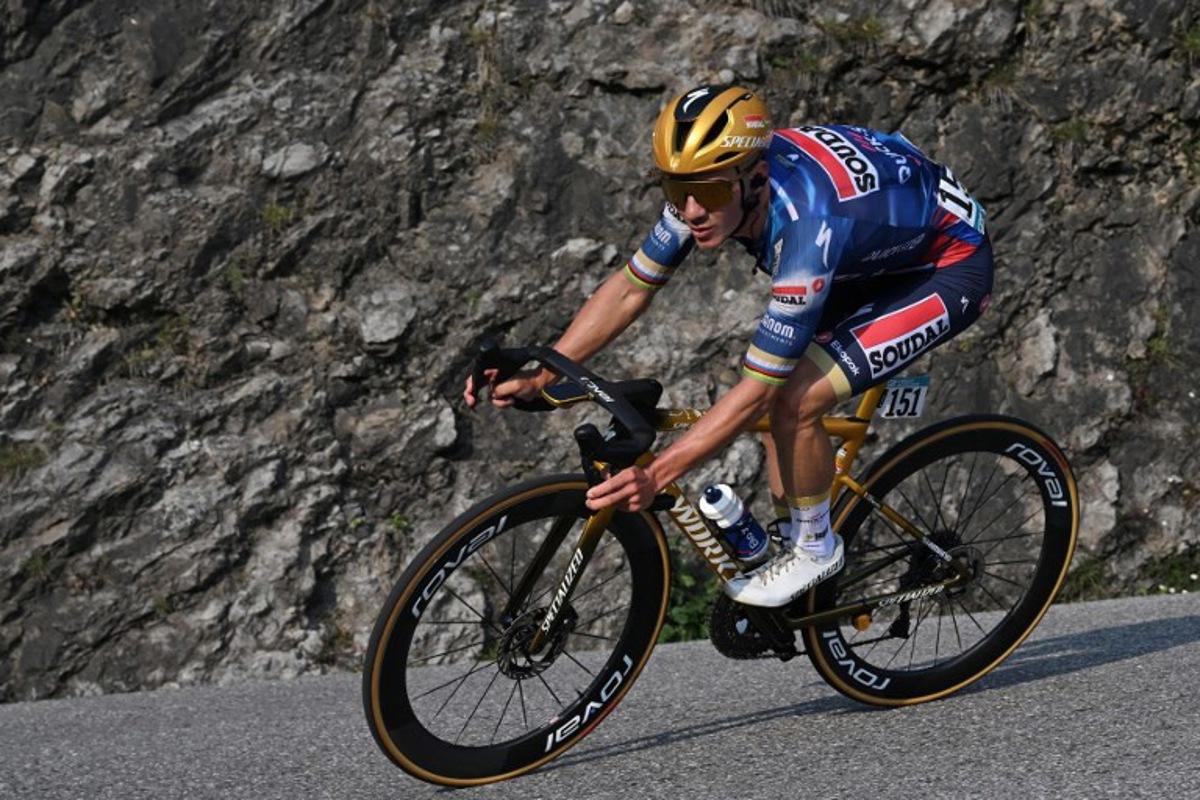 Soudal Quick-Step's Belgian rider Remco Evenepoel cycles in the final ascent to Bergamo during the 119th edition of the Giro di Lombardia (Tour of Lombardy), a 238km cycling race from Como to Bergamo on October 11, 2025.  Dario BELINGHERI / POOL / AFP