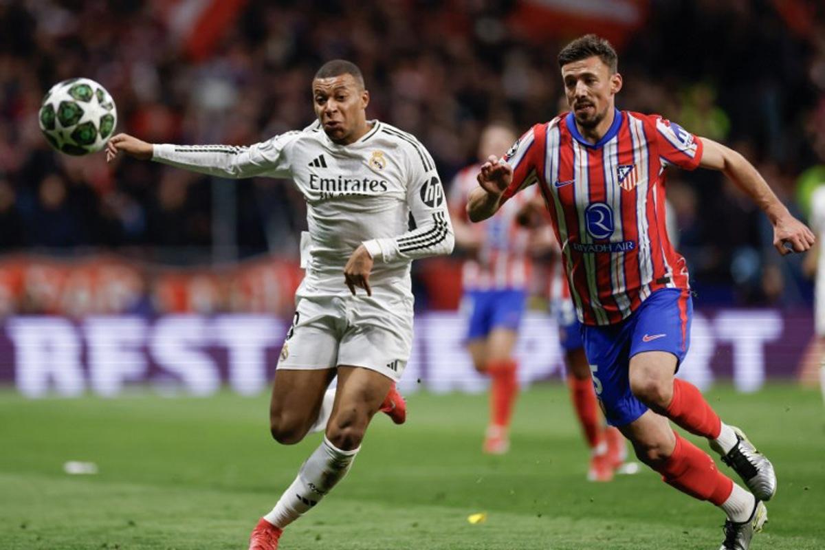 Real Madrid's French forward #09 Kylian Mbappe (L) is challenged by Atletico Madrid's French defender #15 Clement Lenglet during the UEFA Champions League Round of 16 second leg football match between Club Atletico de Madrid and Real Madrid CF at the Metropolitano stadium in Madrid on March 12, 2025.  Oscar DEL POZO CAÑAS / AFP