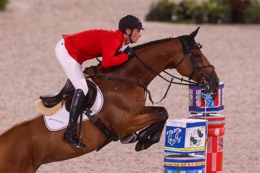 Germany's Daniel Deusser rides Killer Queen in the equestrian's jumping individual qualifying during the Tokyo 2020 Olympic Games at the Equestrian Park in Tokyo on August 3, 2021.  Behrouz MEHRI / AFP