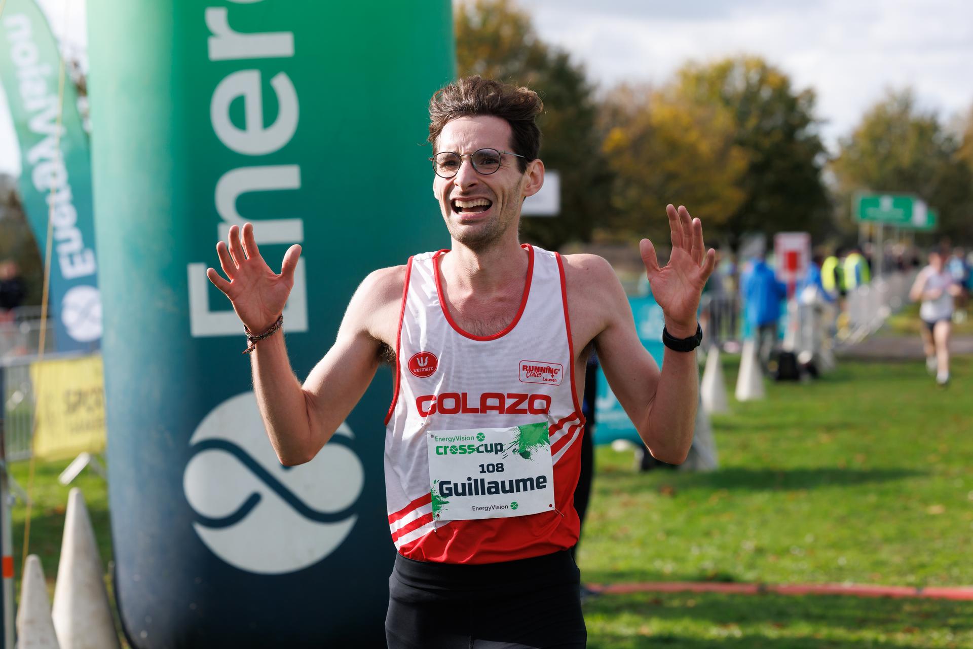 Belgian Guillaume Grimard celebrates as he crosses the finish line to win the men's race at the CrossCup cross country running athletics event in Roeselare, the second and stage of the CrossCup competition, Sunday 26 October 2025. BELGA PHOTO KURT DESPLENTER