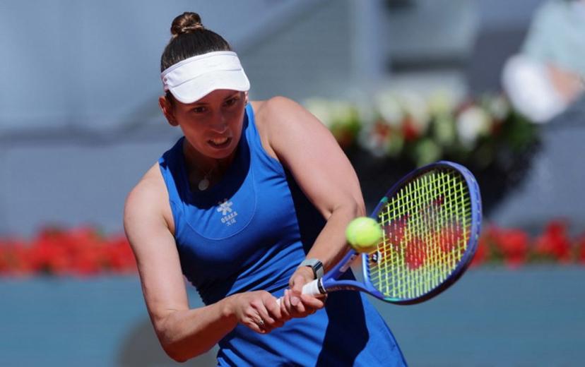 Belgium's Elise Mertens returns the ball to Belarus' Aryna Sabalenka during their 2025 WTA Tour Madrid Open tennis tournament third round singles match at the Caja Magica in Madrid, on April 27, 2025.   Thomas COEX / AFP