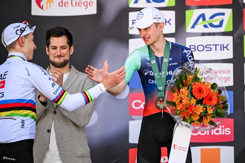 Slovenian Tadej Pogacar of UAE Team Emirates-XRG and French Paul Seixas of Decathlon CMA CGM Team pictured on the podium after the men elite race of the Liege-Bastogne-Liege UCI World Tour one day cycling race, 259,5km from Liege, over Bastogne to Liege, Sunday 26 April 2026. BELGA PHOTO MAARTEN STRAETEMANS