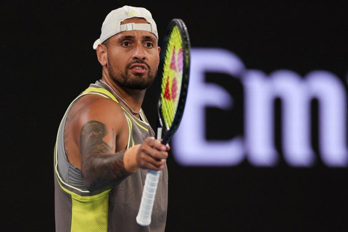 Australia's Nick Kyrgios reacts after a point against Australia's James Duckworth and Aleksandar Vukic during their men's doubles match on day five of the Australian Open tennis tournament in Melbourne on January 16, 2025.  Adrian DENNIS / AFP