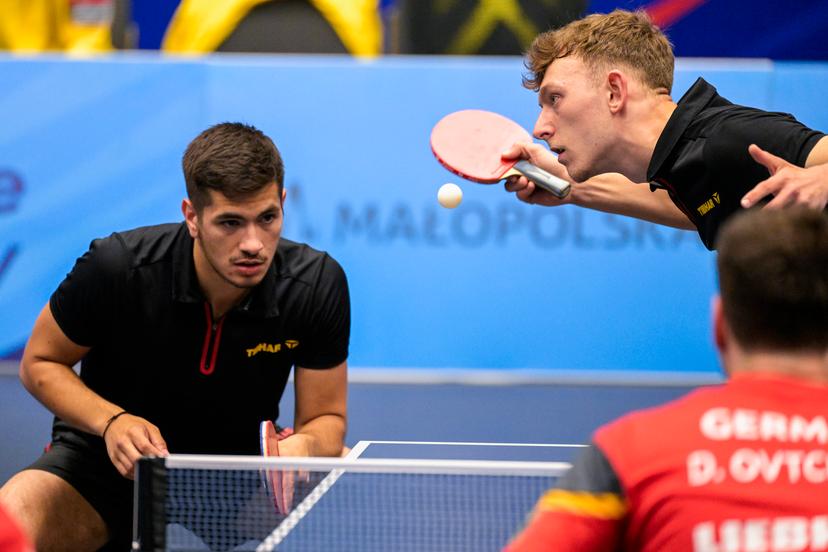 Table Tennis player Martin Allegro and Table Tennis player Adrien Rassenfosse pictured in action during a match in the Men's Team Quarterfinal between Belgium and Germany, in the Table Tennis competition at the European Games in Krakow, Poland on Thursday 29 June 2023. The 3rd European Games, informally known as Krakow-Malopolska 2023, is a scheduled international sporting event that will be held from 21 June to 02 July 2023 in Krakow and Malopolska, Poland. BELGA PHOTO LAURIE DIEFFEMBACQ