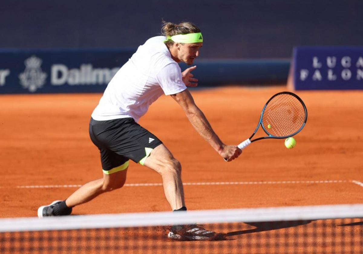 Germany's Alexander Zverev returns a ball to Hungary's Fabian Marozsan during their men's singles semi final match of the ATP Munich Open tennis tournament in Munich, southern Germany on April 19, 2025.  Alexandra BEIER / AFP