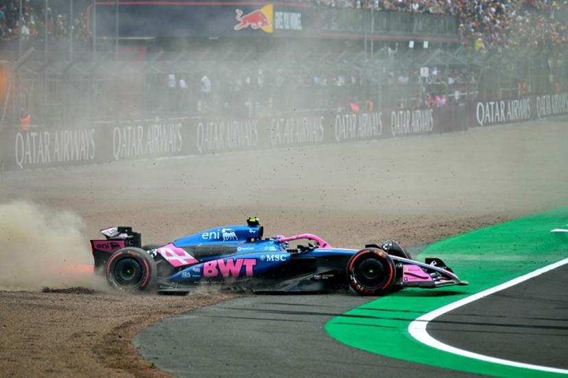 Alpine's Argentinian driver Franco Colapinto spins out into the gravel during the qualifying session ahead of the Formula One British Grand Prix at the Silverstone motor racing circuit in Silverstone, central England, on July 5, 2025.  Andrej ISAKOVIC / AFP