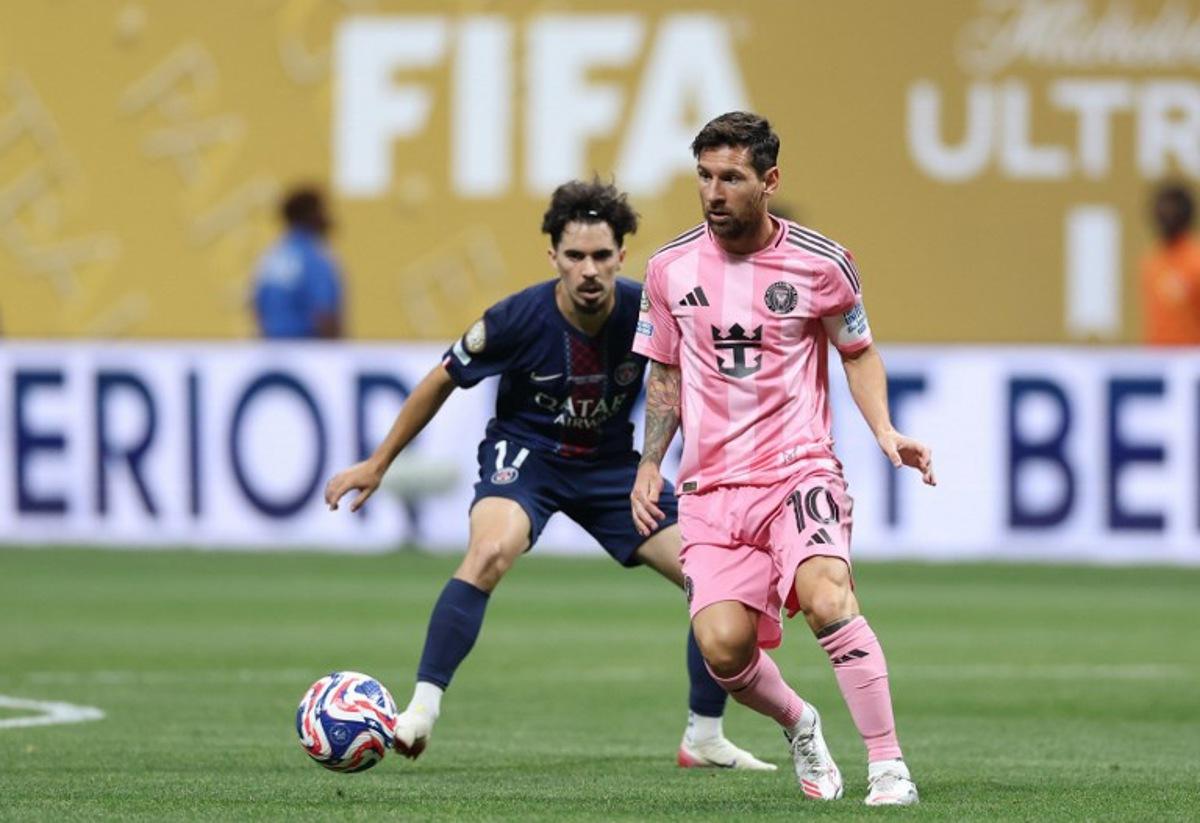Inter Miami's Argentine forward #10 Lionel Messi and Paris Saint-Germain's Portuguese midfielder #17 Vitinha fight for the ball during the FIFA Club World Cup 2025 round of 16 football match between France's Paris Saint-Germain and US Inter Miami at the Mercedes-Benz Stadium in Atlanta on June 29, 2025.  CHARLY TRIBALLEAU / AFP