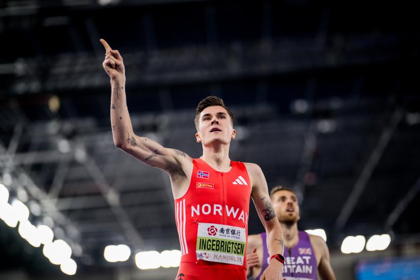 Norwegian Jakob Ingebrigtsen celebrates as he crosses the finish line to win the World Athletics Indoor Championships, in Nanjing, China, Sunday 23 March 2025. The championships take place from 21 to 23 March. BELGA PHOTO JASPER JACOBS
