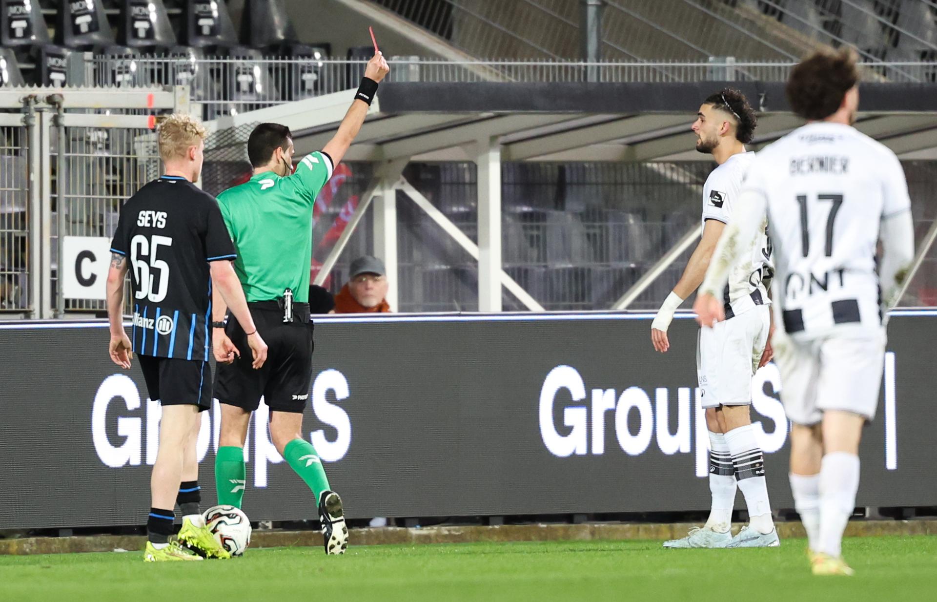 Charleroi's Kevin Van Den Kerkhof receives a red card from the referee during a soccer match between Sporting Charleroi and Club Brugge KV, Sunday 01 March 2026 in Charleroi, on day 27 of the 2025-2026 'Jupiler Pro League' first division of the Belgian championship. BELGA PHOTO VIRGINIE LEFOUR