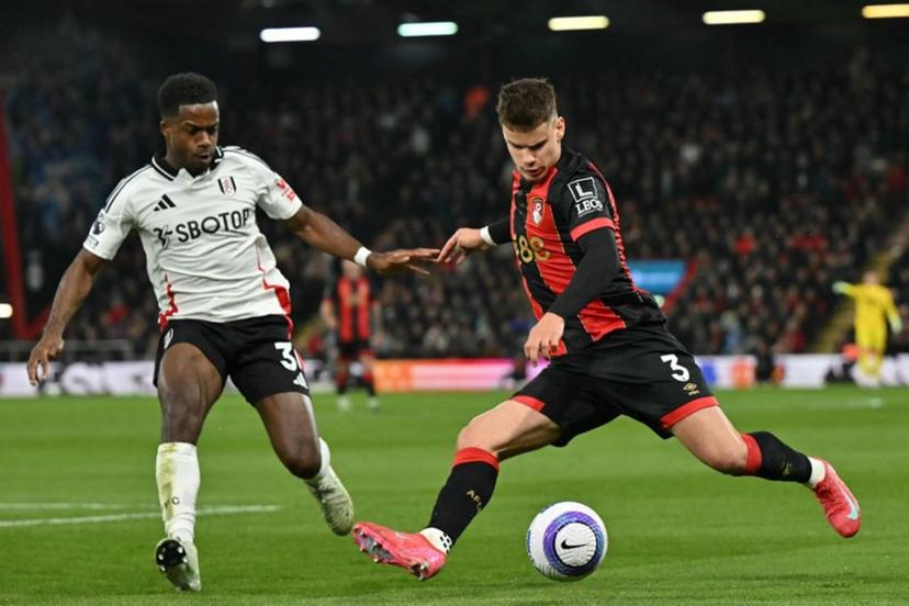 Bournemouth's Hungarian defender #03 Milos Kerkez (R) vies with Fulham's English midfielder #30 Ryan Sessegnon (L) during the English Premier League football match between Bournemouth and Fulham at the Vitality Stadium in Bournemouth, southern England on April 14, 2025.  Glyn KIRK / AFP