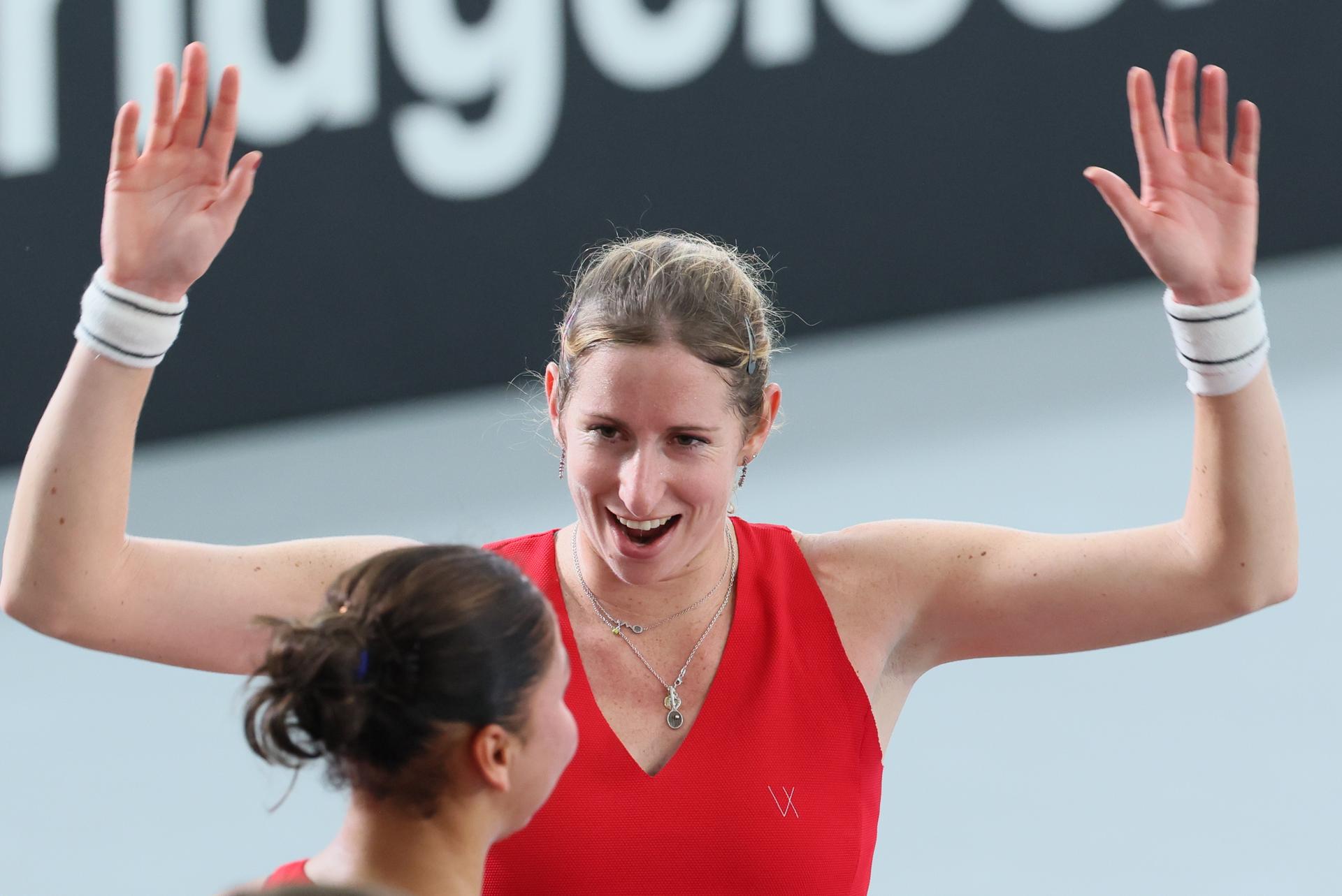 Belgian Sofia Costoulas and Belgian Magali Kempen celebrate after winning the third game, a double game between Belgian pair Costoulas-Kempen and Turkish pair Aksu-Oz, in the Billie Jean King Cup Play-offs, between Belgium and Turkey, on Saturday 15 November 2025 in Ismaning, Germany. PHOTO BENOIT DOPPAGNE