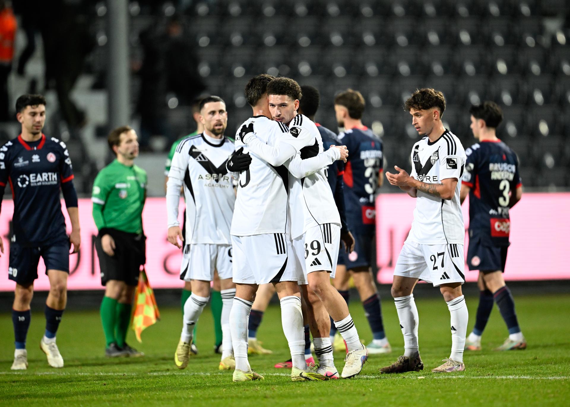 Eupen's players celebrate after winning a soccer game between KAS Eupen and KV Kortrijk, Saturday 07 February 2026 in Eupen, on day 24 of the 2025-2026 'Challenger Pro League' 1B second division of the Belgian championship. BELGA PHOTO JOHN THYS