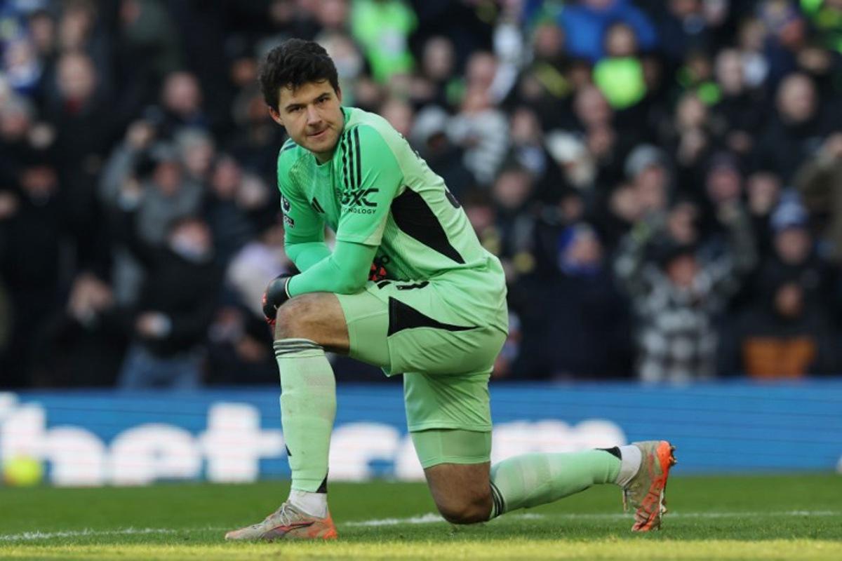 Manchester United's Belgian goalkeeper #31 Senne Lammens reacts after Leeds scored the opening goal during the English Premier League football match between Leeds United and Manchester United at Elland Road in Leeds, northern England on January 4, 2026.  Darren Staples / AFP