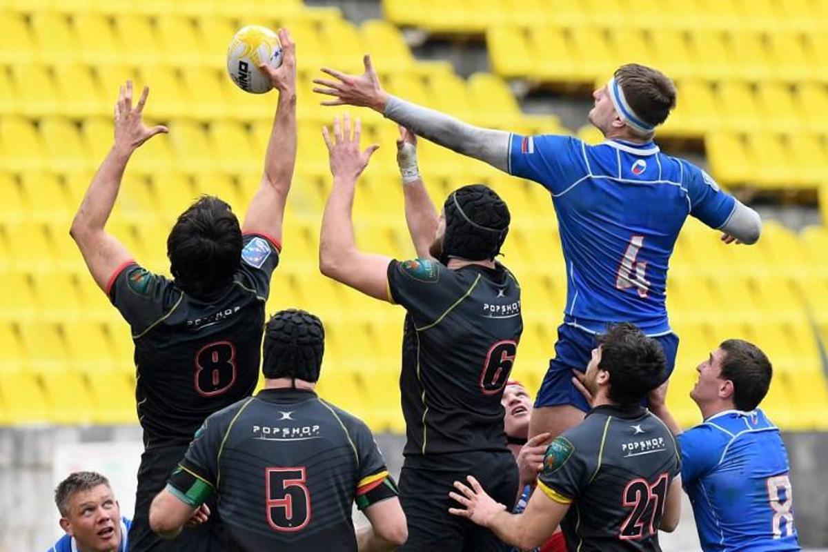 Russia's lock Bogdan Fedotko (R) vies Belgium's number 8 Bertrand Billi (L) and back row Gillian Benoy during the Rugby union Europe Championship match between Russia and Belgium in Sochi on February 16, 2019.  Kirill KUDRYAVTSEV / AFP
