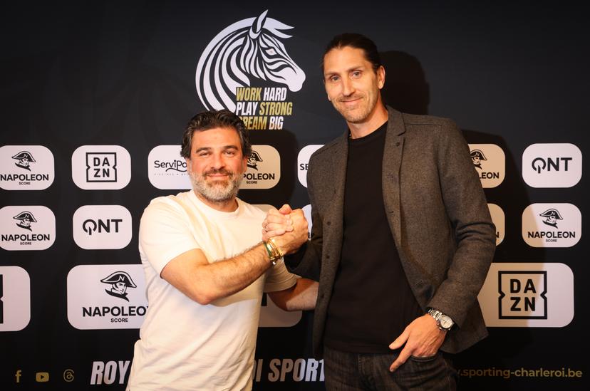 Charleroi's manager Mehdi Bayat and Charleroi's sports director Nicolas Frutos shake hands after a press conference of Belgian soccer club Sporting Charleroi to present their new sports director, in Charleroi, on Monday 02 March 2026. BELGA PHOTO VIRGINIE LEFOUR