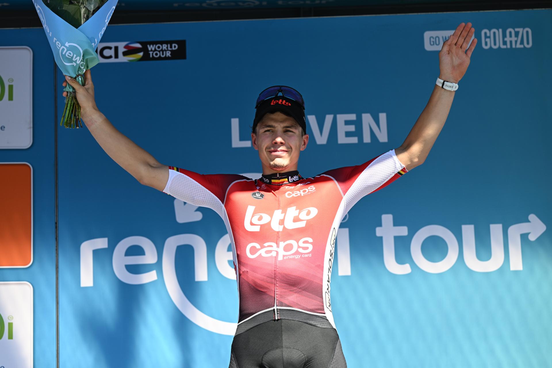Belgian Arnaud De Lie of Lotto Cycling Team celebrates on the podium after winning the fifth and last stage of the 'Renewi Tour' multi-stage cycling race, 185km from and to Leuven on Sunday 24 August 2025. The five-day race takes place in Belgium and the Netherlands.  BELGA PHOTO DAVID PINTENS
