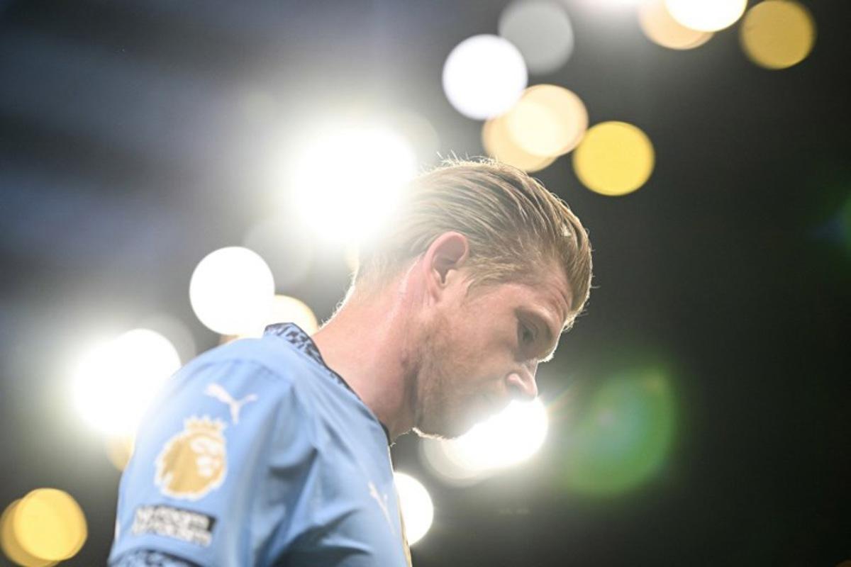 Manchester City's Belgian midfielder #17 Kevin De Bruyne reacts during the English Premier League football match between Manchester City and Aston Villa at the Etihad Stadium in Manchester, north west England, on April 22, 2025.  Oli SCARFF / AFP