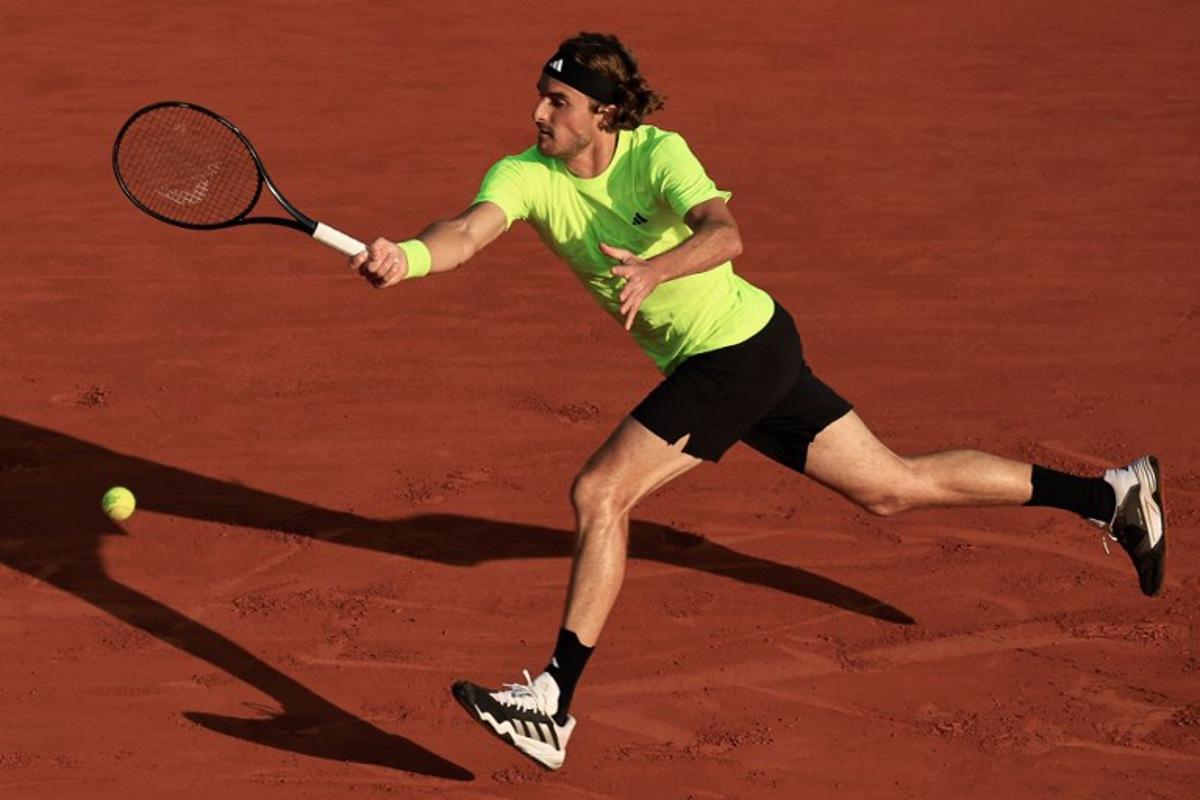 Greece's Stefanos Tsitsipas plays a forehand return to Portugal's Nuno Borges during the Monte Carlo ATP Masters Series Tournament round of 16 tennis match on the Rainier III court at the Monte Carlo Country Club in Roquebrune-Cap-Martin on April 10, 2025.  Valery HACHE / AFP