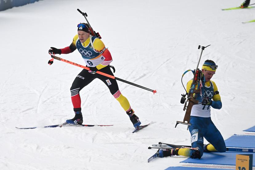 Belgian biathlete Thierry Langer (L) pictured in action during the Biathlon Men's 20km Individual competition at the Anterselva Biathlon Arena in Cortina, part of the Milano Cortina 2026 Olympic Winter Games, on Tuesday 10 February 2026, Italy. The XXV Winter Olympics take place from 6 to 22 February 2026 in Italy. BELGA PHOTO ANTHONY BEHAR - BENELUX ONLY