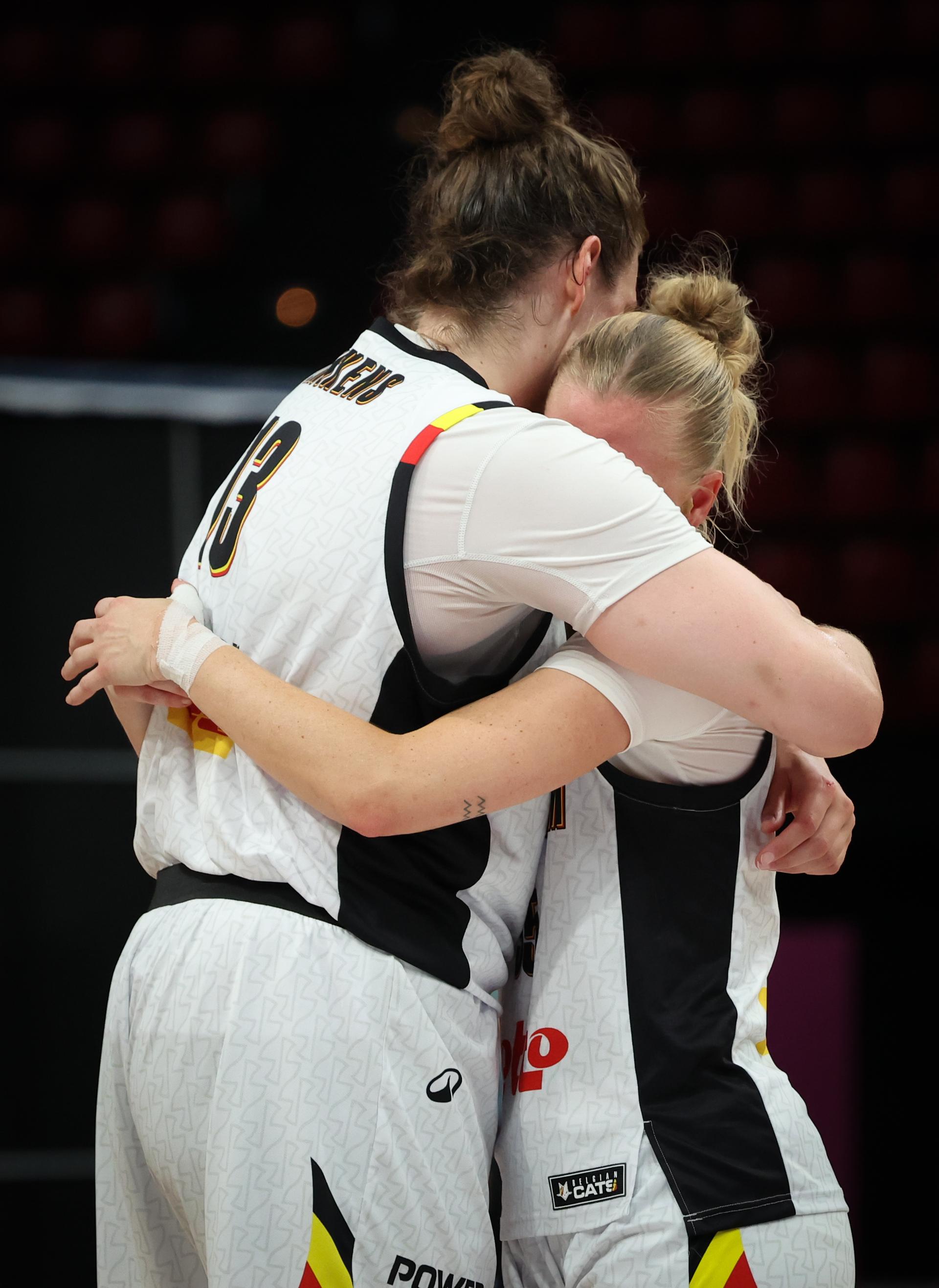 Belgium's Kyara Linskens and Belgium's Julie Vanloo celebrate after winning a basketball match between Belgian national team 'the Belgian Cats' and Italy, in the semi-finals of the FIBA Women's EuroBasket tournament, Friday 27 June 2025 in Piraeus, Greece. BELGA PHOTO VIRGINIE LEFOUR