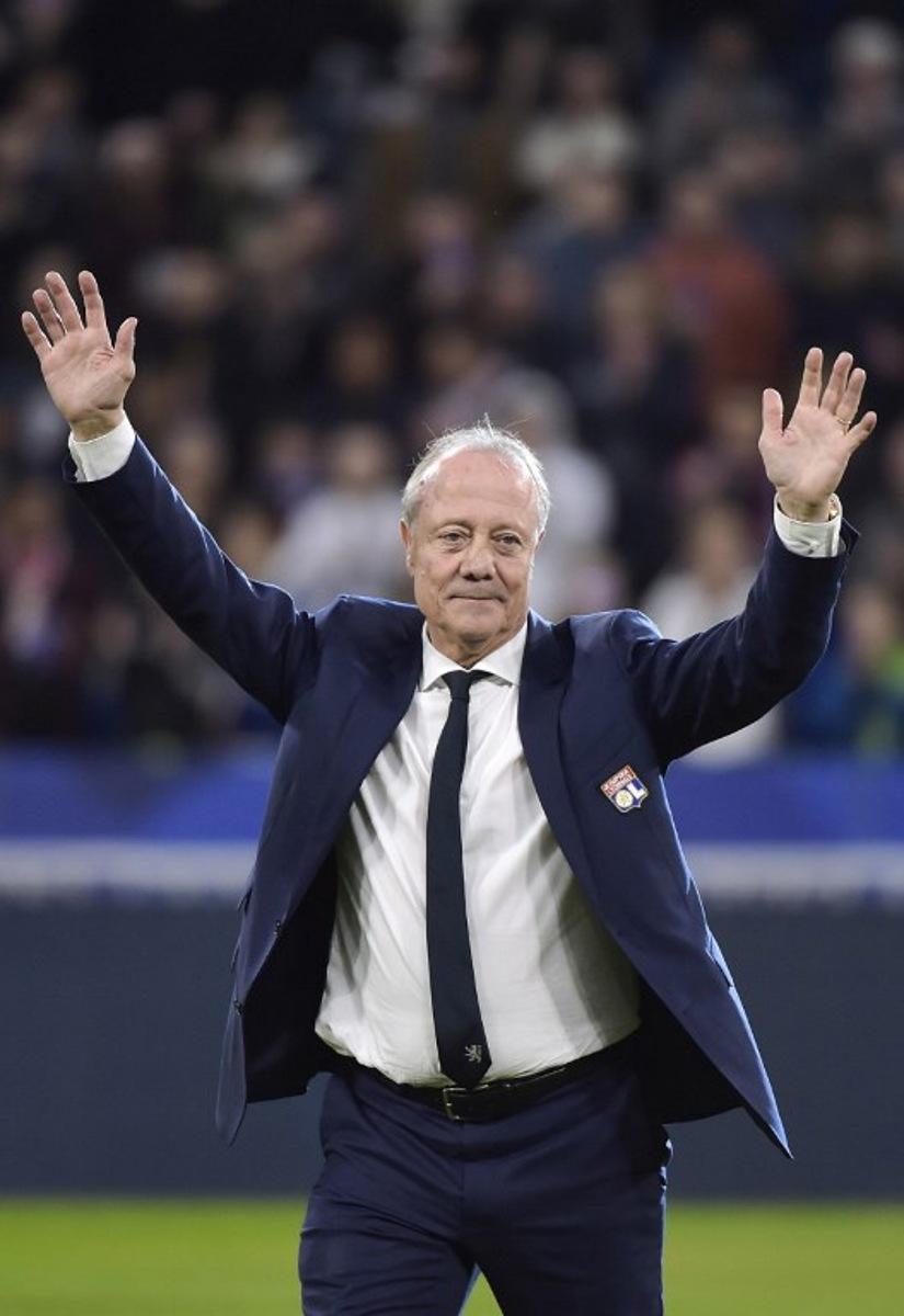 (FILES) Special advisor to Lyon's president, former player Bernard Lacombe celebrates his retirement on the pitch ahead of the French L1 football match between Olympique Lyonnais and Stade Rennais Football Club at the Groupama stadium in Decines-Charpieu near Lyon, central eastern France on December 15, 2019. Bernard Lacombe, a former player and leading figure in French football and at Olympique Lyonnais, died on June 17, 2025 at the age of 72, the club announced. "It was with great sadness that we learned this Tuesday evening of the death of Bernard Lacombe. Our thoughts are with his family and friends, but also with all those who loved Olympique Lyonnais and football. Farewell Bernard, you were our legend, the greatest of them all," wrote the club in a statement. ROMAIN LAFABREGUE / AFP
