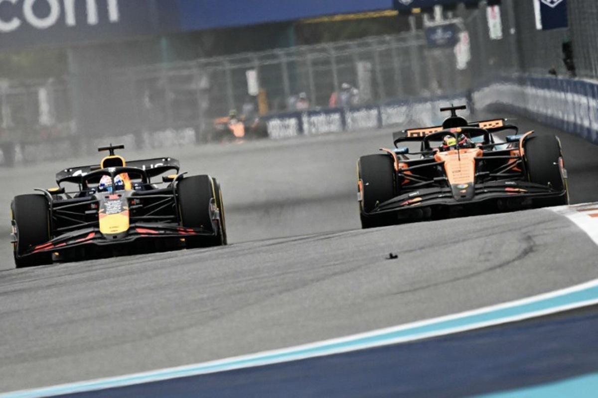 (L-R) Red Bull Racing's Dutch driver Max Verstappen and McLaren's Australian driver Oscar Piastri race during the 2025 Miami Formula One Grand Prix at Miami International Autodrome in Miami Gardens, Florida, on May 4, 2025.   Chandan Khanna / AFP