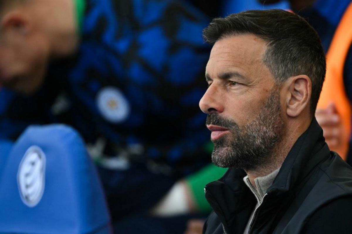 Leicester City's Dutch manager Ruud van Nistelrooy reacts prior to the English Premier League football match between Brighton and Hove Albion and Leicester City at the American Express Community Stadium in Brighton, southern England on April 12, 2025.  Glyn KIRK / AFP