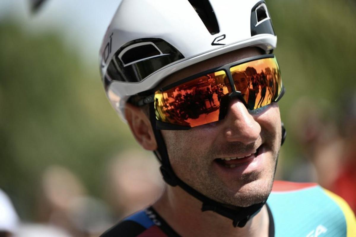 Team Lotto's Italian rider Elia Viviani arrives to compete in the first stage of the Vuelta a Espana, a 183 km race between Torino - Reggia di Venaria and Novara, in Italy's Piemonte region, on August 23, 2025.    Marco BERTORELLO / AFP