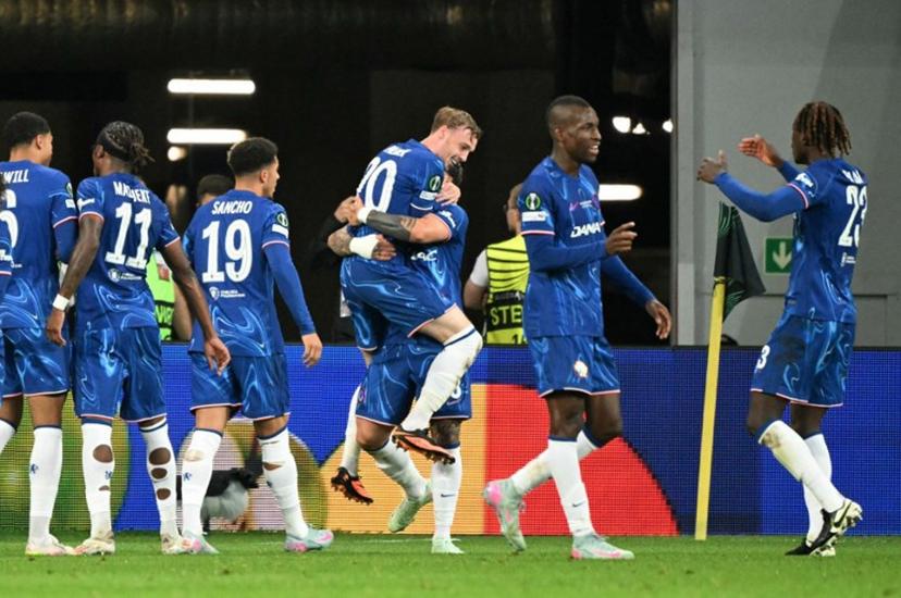 Chelsea's players celebrate after Chelsea's Argentinian midfielder #08 Enzo Fernandez scored his team's first goal during the UEFA Conference League final football match between Real Betis and Chelsea FC in Wroclaw on May 28, 2025.   Sergei GAPON / AFP